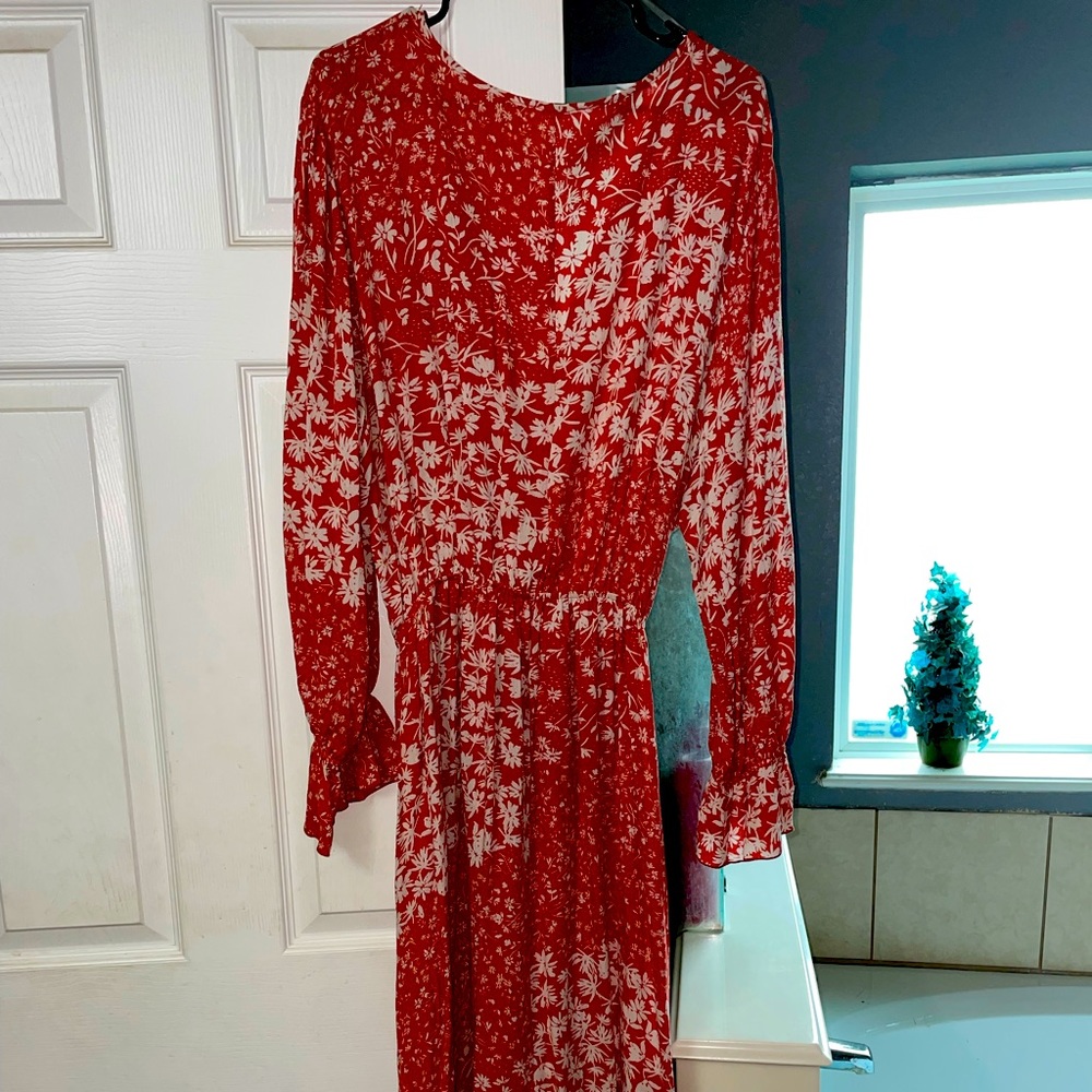 Boutique dress, rusty orange with white floral design.
